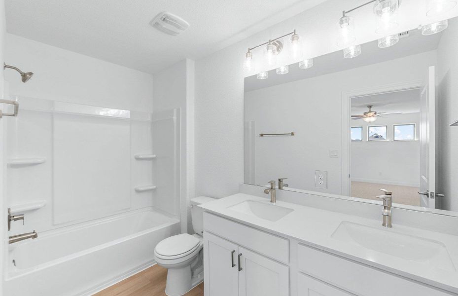 Furnished interior view inside a new home in Saddleback at Santa Rita Ranch, Liberty Hill (Image 5). Furnished interior view inside a new home in Saddleback at Santa Rita Ranch, Liberty Hill (Image 5).