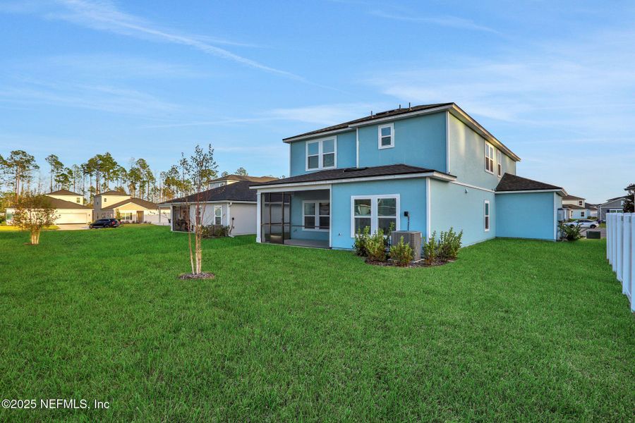 Exterior details and patio area of a home in Cordova Palms, St. Augustine (Image 4).