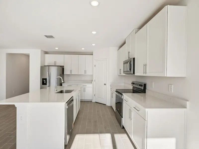 Furnished interior view inside a new home in Oakfield Trails - Classic Series, Parrish (Image 4).