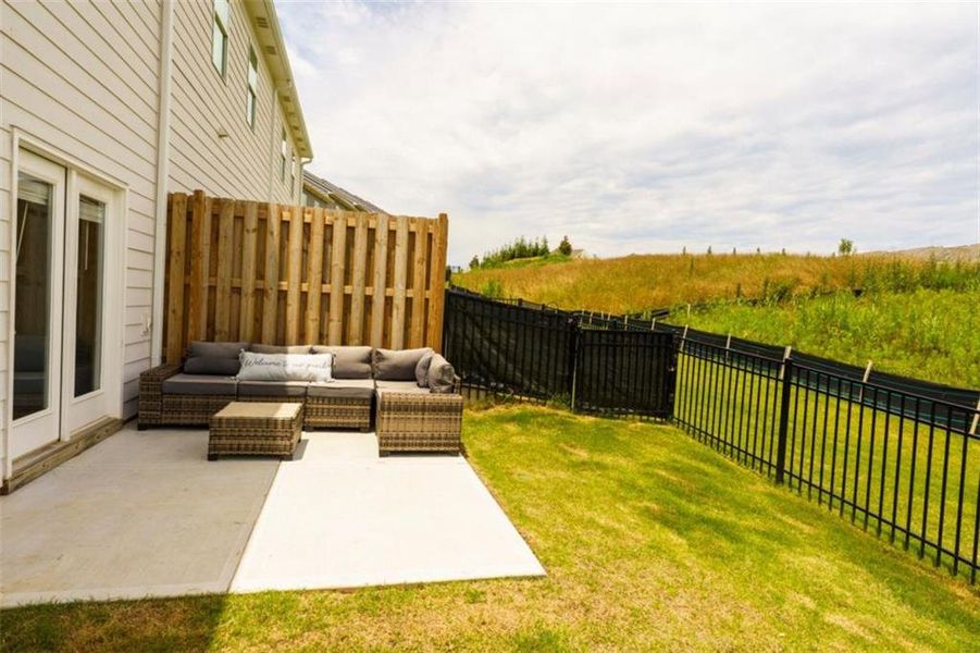Exterior details and patio area of a home in Rolling Meadows, Jasper (Image 26).