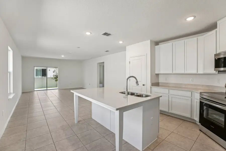 Representative furnished interior of a home built from the Vista by Maronda Homes in Malabar Springs, Palm Bay (Image 7).