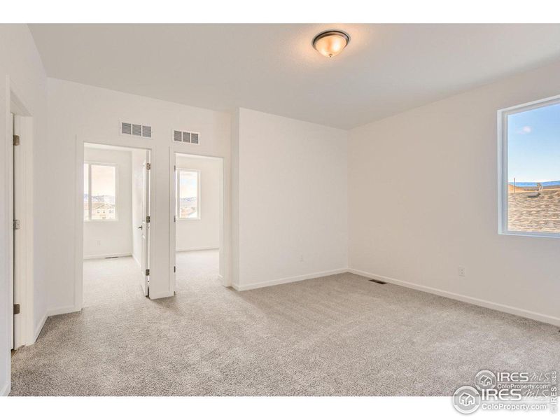 Huge family room/loft area upstairs flowing into the 2nd and 3rd bedrooms