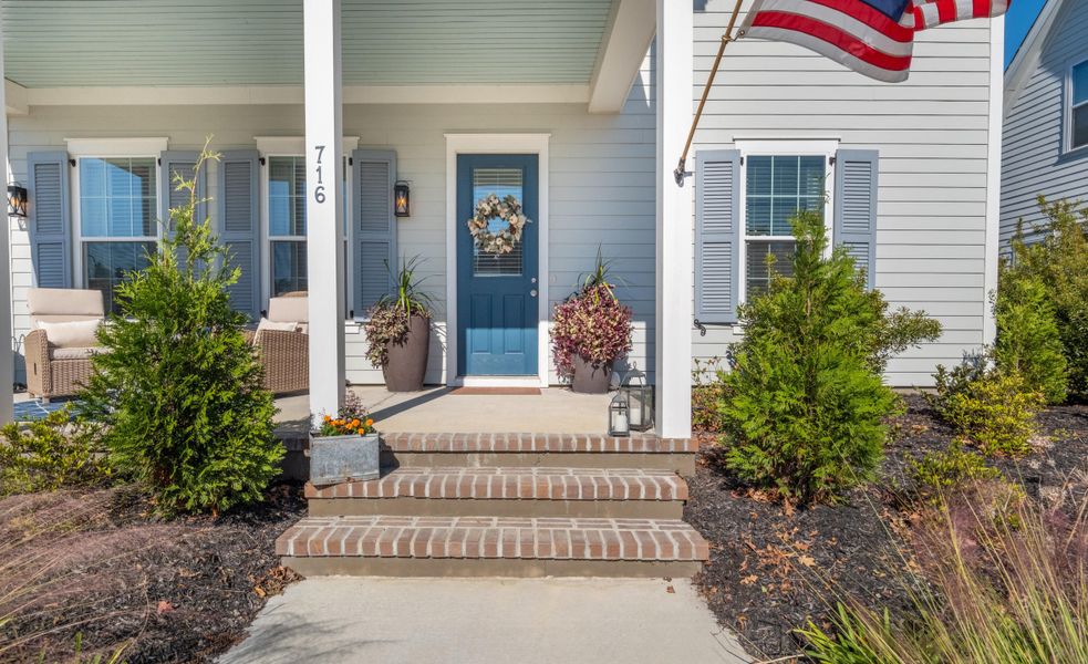 Exterior details and patio area of a home in Midtown at Nexton, Summerville (Image 23). Exterior details and patio area of a home in Midtown at Nexton, Summerville (Image 23).