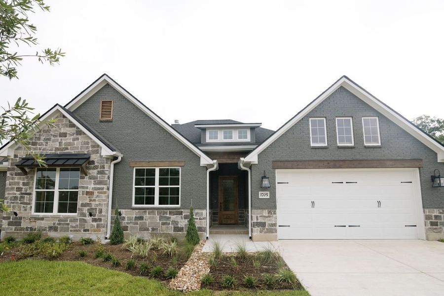 Representative exterior photo of a completed home built from the The Kaylee by Reece Homes in Oakmont, Bryan, TX (Image 2).
