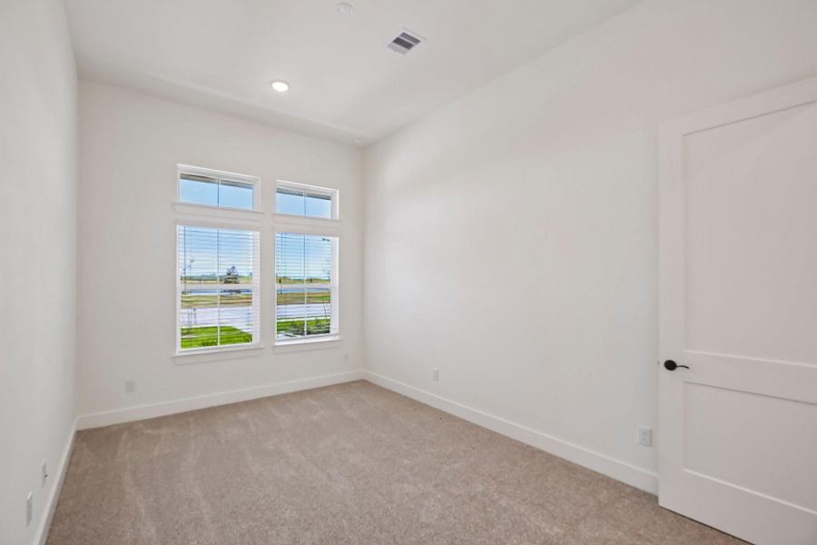 Spacious, unfurnished interior of a new home in Riceland 60',65',70', Old River-Winfree (Image 23).
