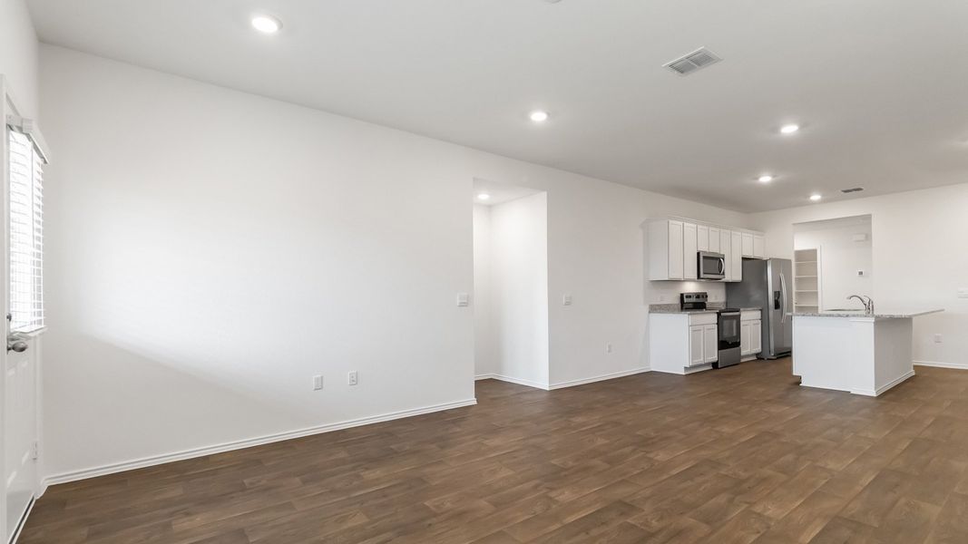 Representative unfurnished interior of a home built from the The Juniper by D.R. Horton in Palomino, Manor (Image 12).
