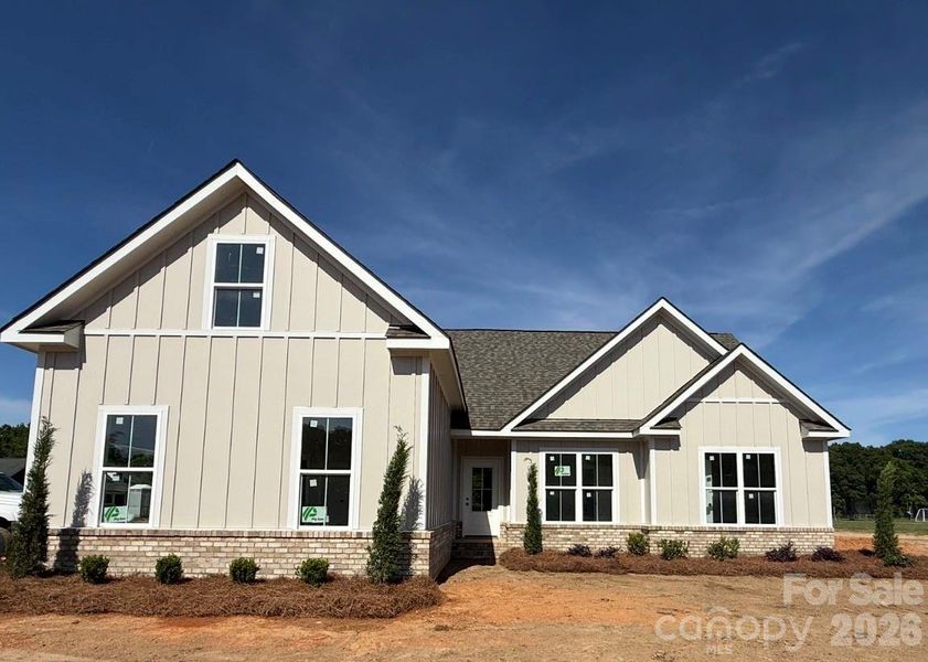 Front exterior of a new home in , Monroe, NC, highlighting curb appeal (Image 1). Front exterior of a new home in , Monroe, NC, highlighting curb appeal (Image 1).
