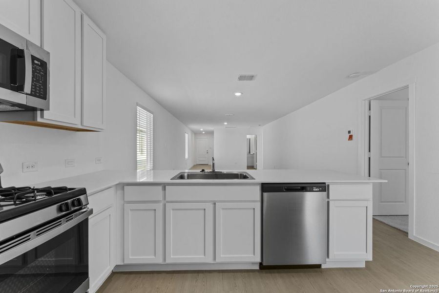 Furnished interior view inside a new home in Torian Village, San Antonio (Image 5).
