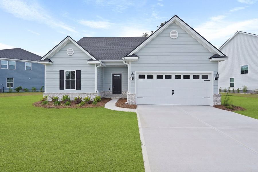 Representative exterior photo of a completed home built from the Harbor II by Ernest Homes in Wexford, Richmond Hill, GA (Image 27).