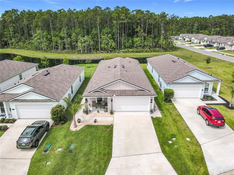 Front exterior of a new home in , Bunnell, FL, highlighting curb appeal (Image 22). Front exterior of a new home in , Bunnell, FL, highlighting curb appeal (Image 22).