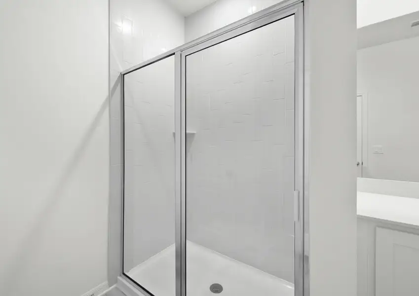 Walk-in shower in the master bath of the Braden - FL home in Fort Pierce.