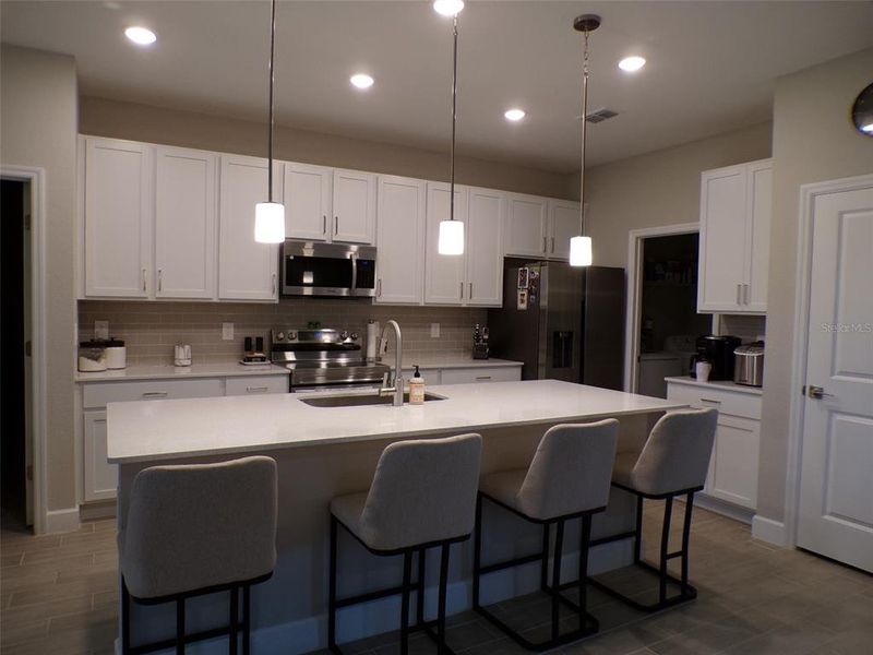 Furnished interior view inside a new home in , North Port (Image 40).
