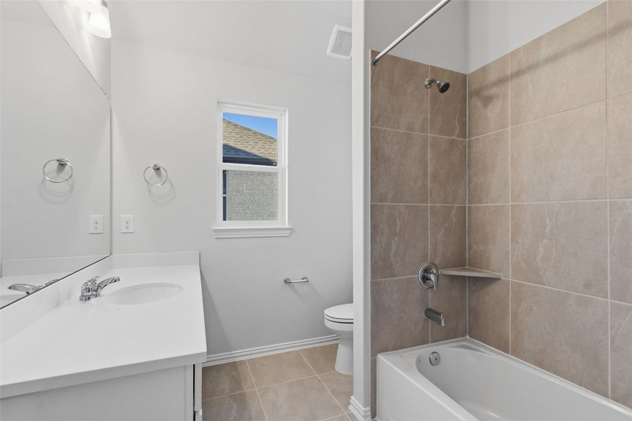 Furnished interior view inside a new home in The Woodlands Hills, Willis (Image 9).