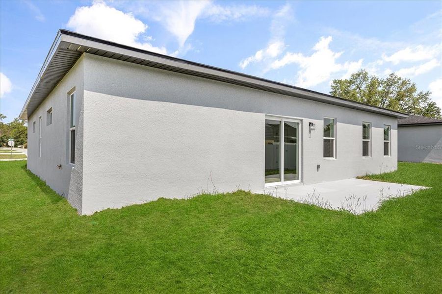 Exterior details and patio area of a home in , Ocala (Image 3).