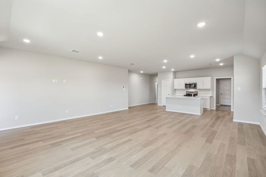 Living Room in the Sabrina home plan by Trophy Signature Homes – REPRESENTATIVE PHOTO