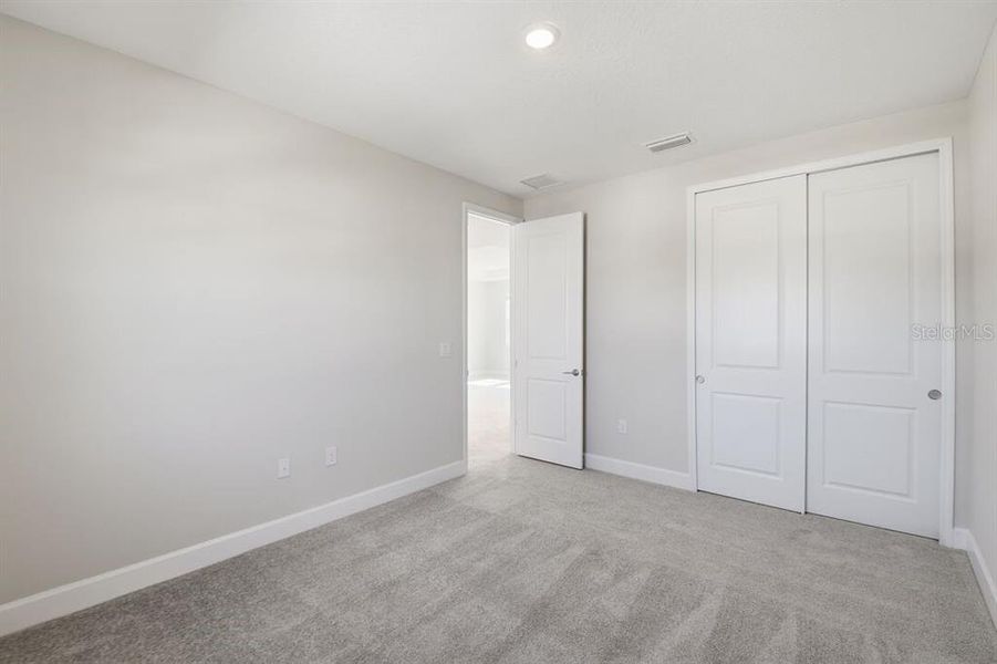 Spacious, unfurnished interior of a new home in Harvest at Ovation, Winter Garden (Image 29).