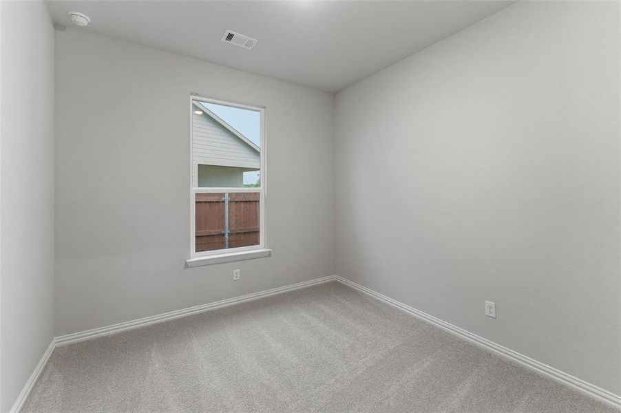 Neutral gray walls complementing light gray carpeting