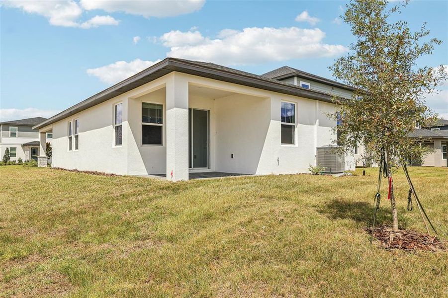 Exterior details and patio area of a home in Cyrene at Minneola, Minneola (Image 4).
