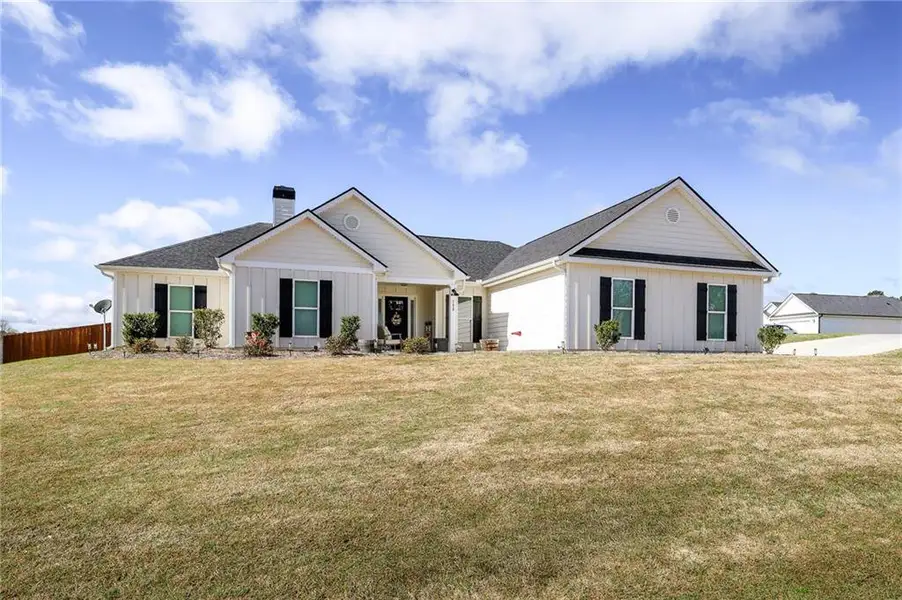 Front exterior of a new home in , Winder, GA, highlighting curb appeal (Image 2). Front exterior of a new home in , Winder, GA, highlighting curb appeal (Image 2).