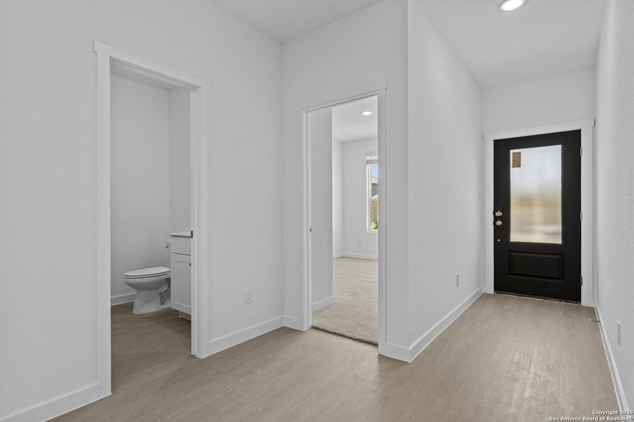 Spacious, unfurnished interior of a new home in Waterwheel: Coastline Collection, San Antonio (Image 19).