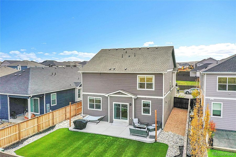 Exterior details and patio area of a home in Settlers Crossing, Commerce City (Image 24).