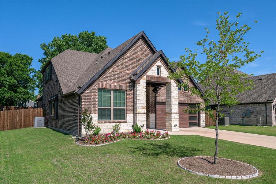 Front exterior of a new home in , Josephine, TX, highlighting curb appeal (Image 1). Front exterior of a new home in , Josephine, TX, highlighting curb appeal (Image 1).