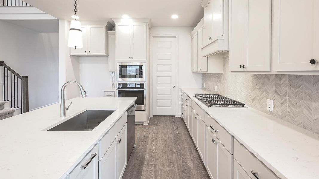 Furnished interior view inside a new home in Crosswinds 50', Kyle (Image 7).