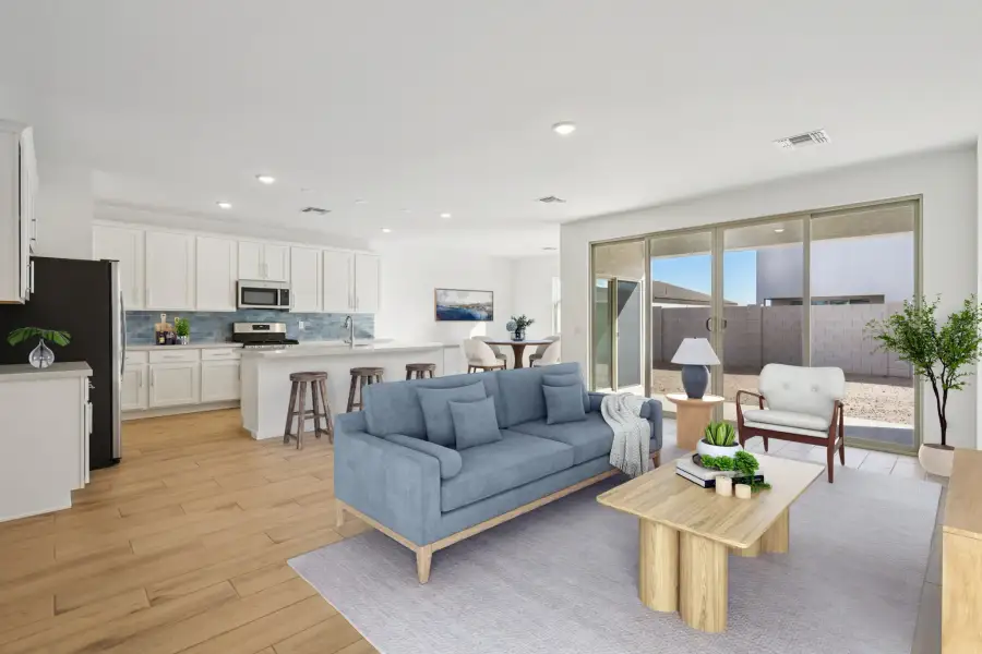 Great room, kitchen and dining with the Coastal Collection. Virtually staged. Finishes may vary.
