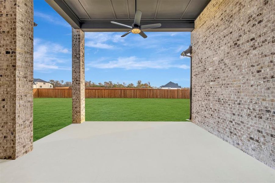 Exterior details and patio area of a home in Northshore at Lakewood Village - Estate Series, Lakewood Village (Image 3).