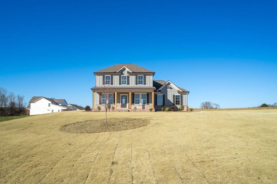 Exterior details and patio area of a home in Magnolia Ridge, Monroe (Image 3).
