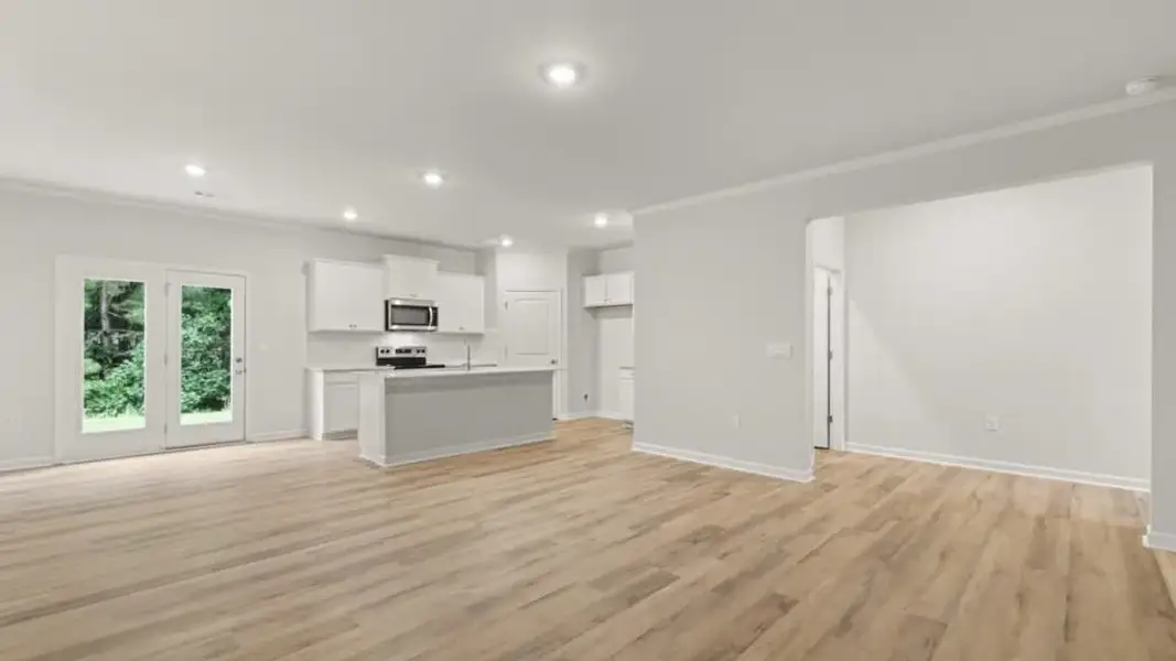Spacious, unfurnished interior of a new home in Waypoint, Flowery Branch (Image 25).