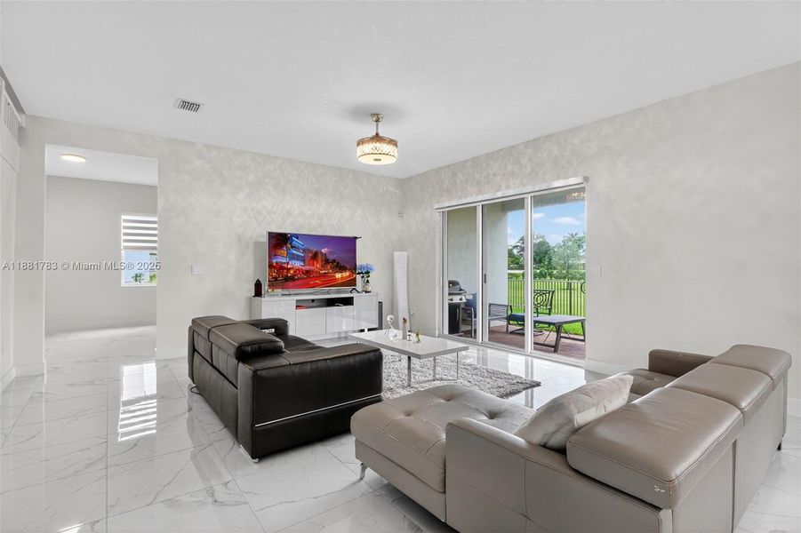 Furnished interior view inside a new home in Crescent Ridge, Davie (Image 8).