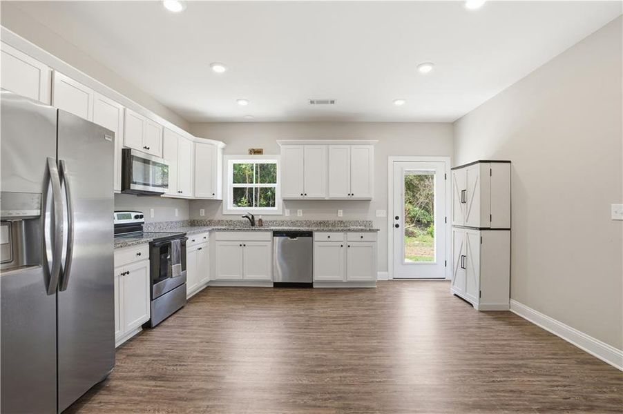 Furnished interior view inside a new home in , Kingston (Image 15).