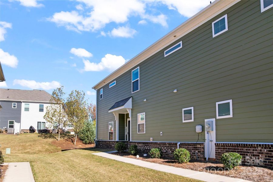 Exterior details and patio area of a home in Harper's Run, Matthews (Image 26).