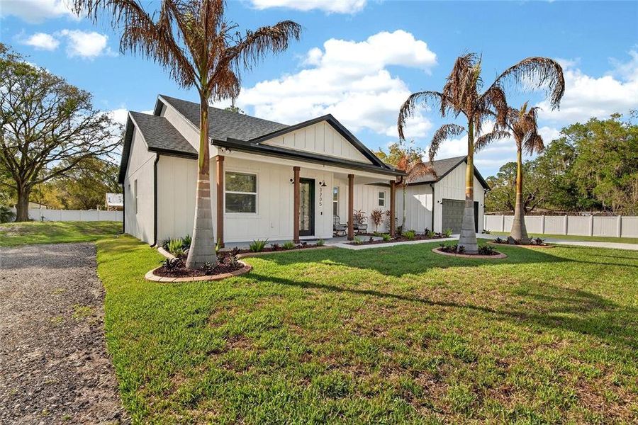 Front exterior of a new home in , Plant City, FL, highlighting curb appeal (Image 22).