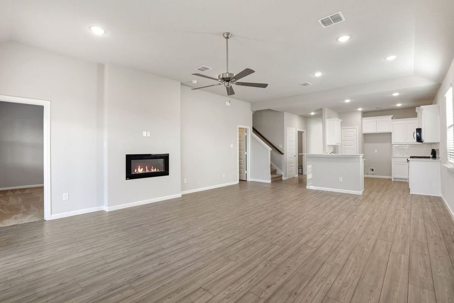 Living Room in the Sapphire home plan by Trophy Signature Homes – REPRESENTATIVE PHOTO Living Room in the Sapphire home plan by Trophy Signature Homes – REPRESENTATIVE PHOTO