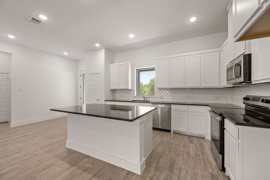 Furnished interior view inside a new home in Saddleback Estates, Boyd (Image 9).