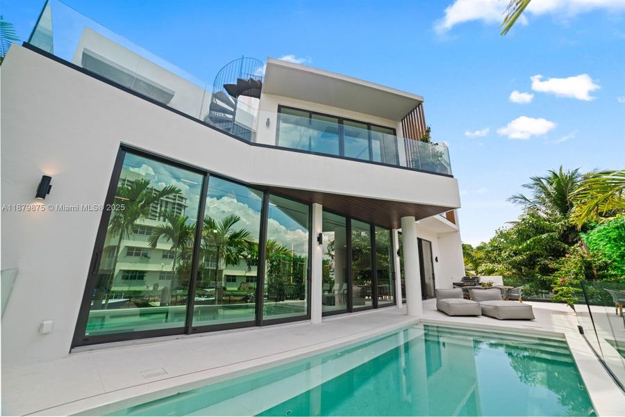 Front exterior of a new home in , Miami Shores, FL, highlighting curb appeal (Image 24).