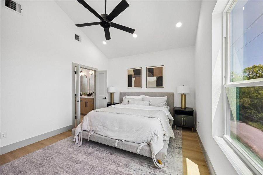 Large windows and soaring ceilings create a peaceful retreat filled with natural light. Large windows and soaring ceilings create a peaceful retreat filled with natural light.