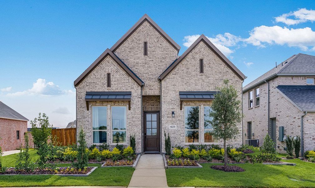 Front exterior of a new home in The Ranch at Uptown Celina, Celina, TX, highlighting curb appeal (Image 1). Front exterior of a new home in The Ranch at Uptown Celina, Celina, TX, highlighting curb appeal (Image 1).