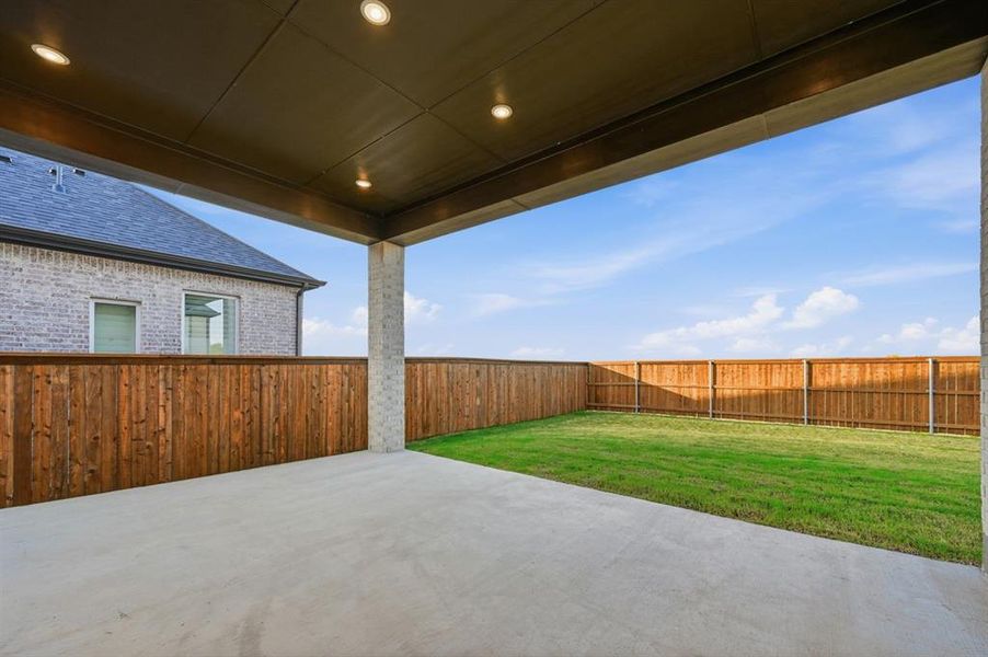 Exterior details and patio area of a home in Saddle Star Estates, Rockwall (Image 3). Exterior details and patio area of a home in Saddle Star Estates, Rockwall (Image 3).