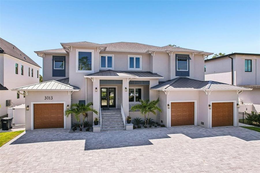 Front exterior of a new home in , Tampa, FL, highlighting curb appeal (Image 27).