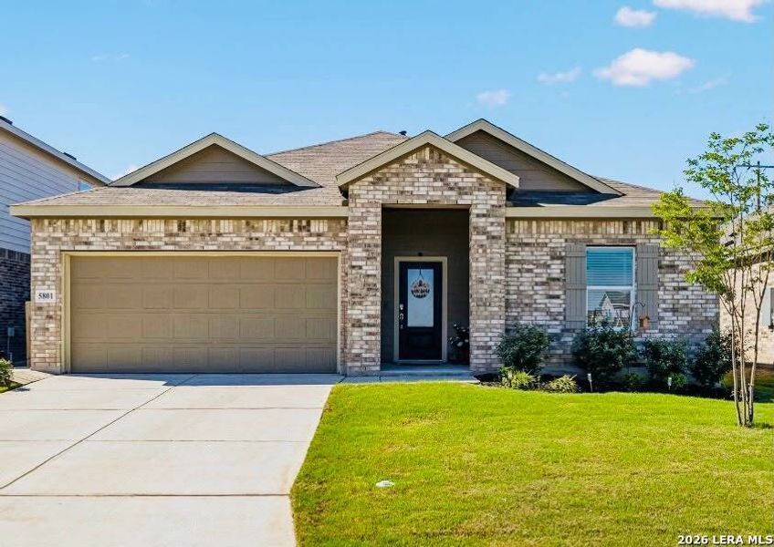 Front exterior of a new home in Navarro Ranch, Seguin, TX, highlighting curb appeal (Image 2). Front exterior of a new home in Navarro Ranch, Seguin, TX, highlighting curb appeal (Image 2).