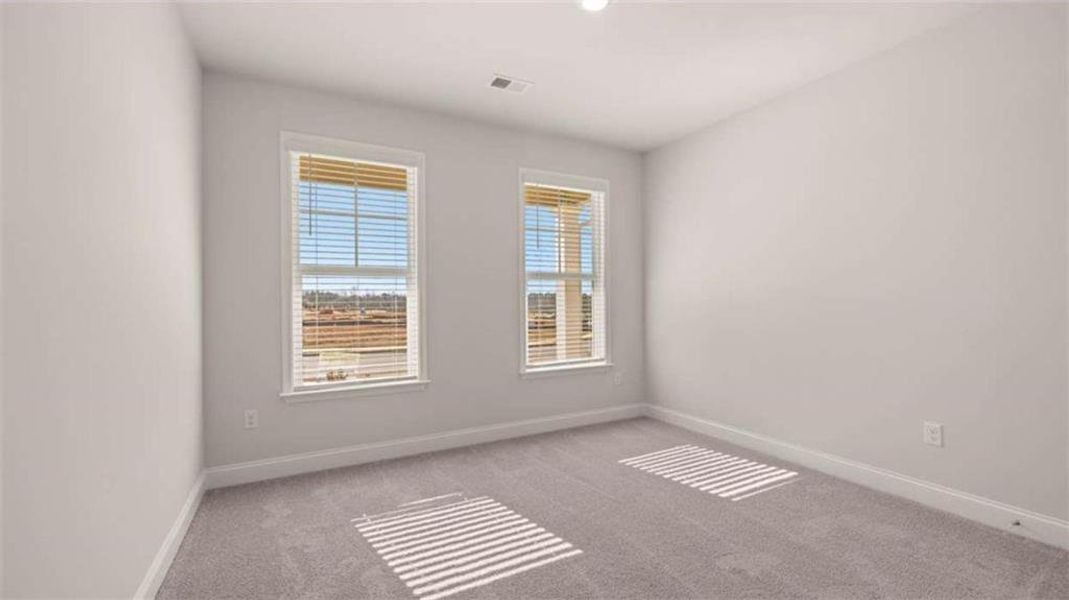 Spacious, unfurnished interior of a new home in Oak Ridge Meadows - Active Adult, Locust Grove (Image 17).