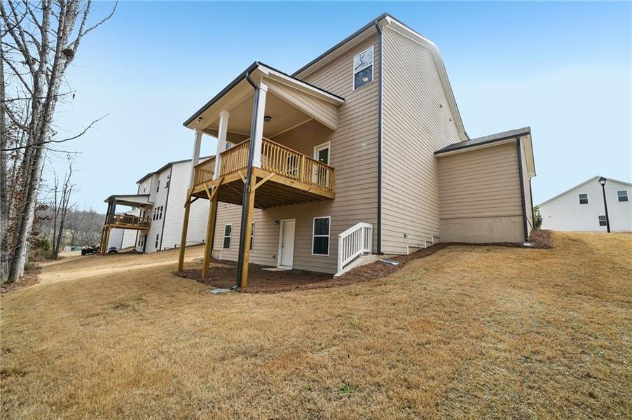Exterior details and patio area of a home in Rosewood Lake Estates, Hoschton (Image 39).