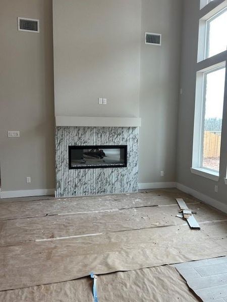 Electric fireplace a focal point in the familly room.