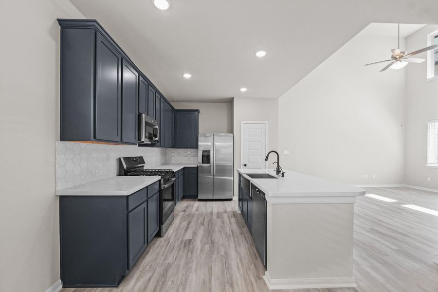 Lovely kitchen with large island (*Photo not of actual home and used for illustration purposes only.) Lovely kitchen with large island (*Photo not of actual home and used for illustration purposes only.)