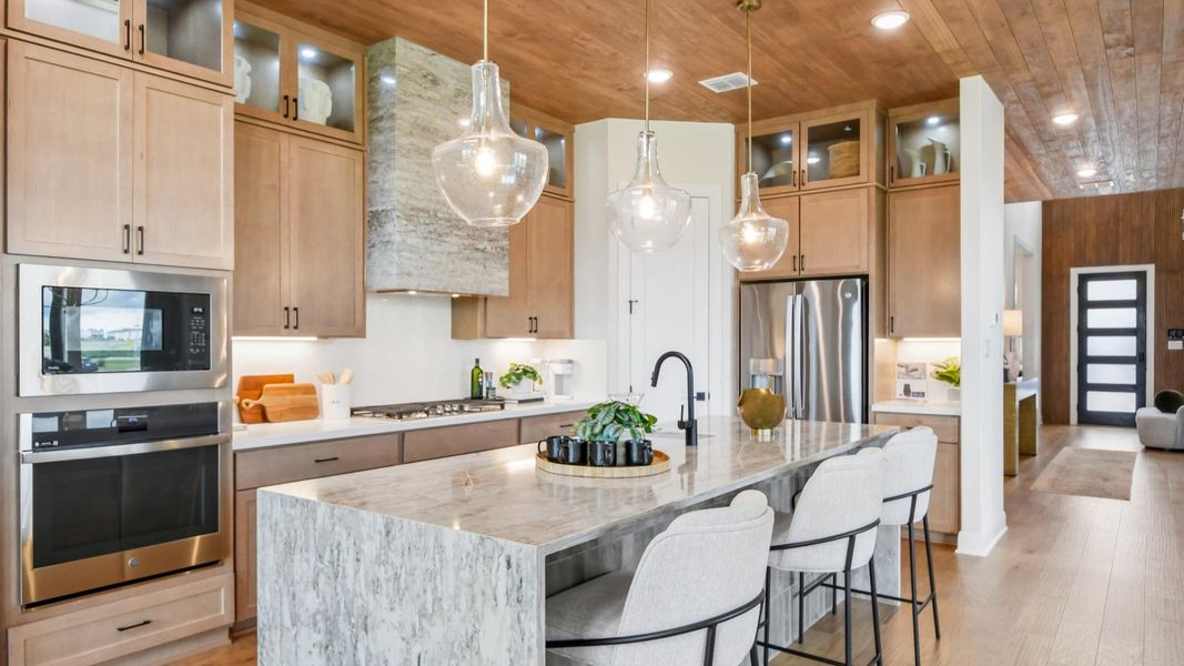 Model home photos of similar floorplans, not pictures of actual home.
