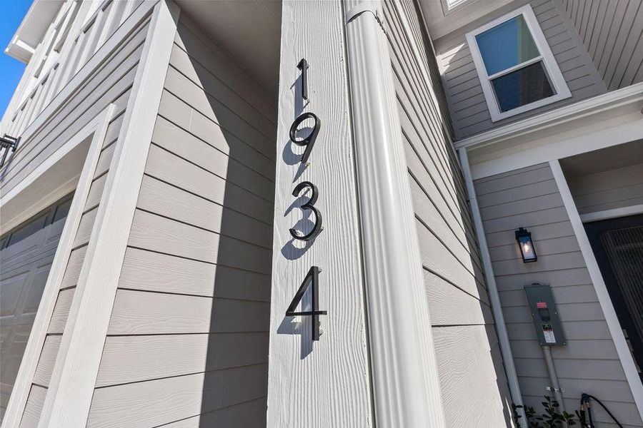 Exterior details and patio area of a home in , Houston (Image 3).