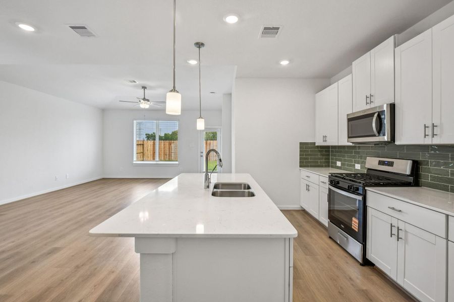 Photo is not of the actual home, but is an inspirational photo of builder’s model home and may depict options, furnishings, and/or decorator features that are not included